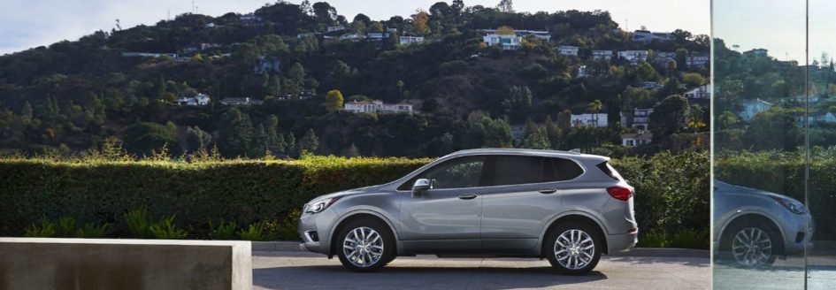 2020 buick envision parked at a house in the country side